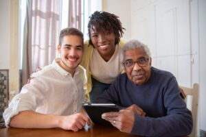 young couple with elderly senior father