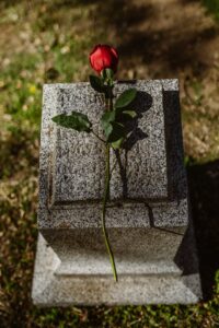 closeup of grave marker tombstone