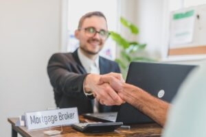 Mortgage broker shaking hands