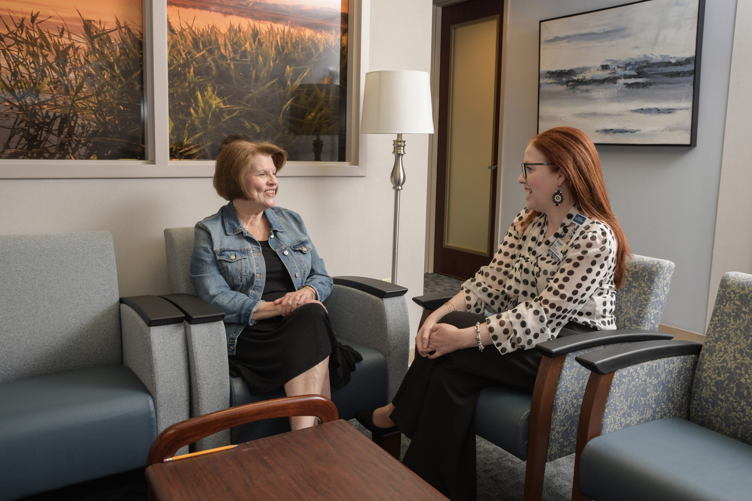 Dr. DeLong speaking with patient